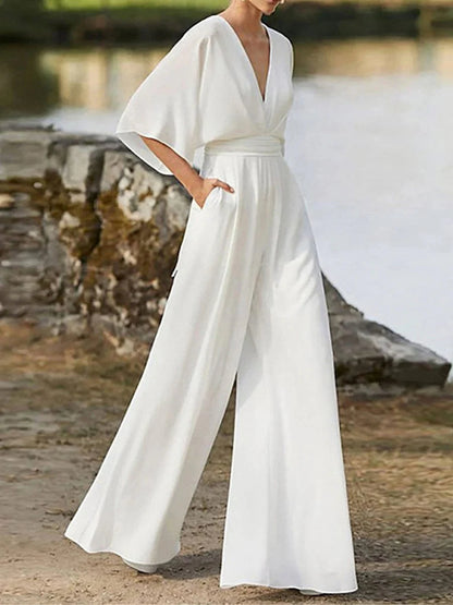 Elegant V-Neck Backless Jumpsuit with 3/4 Length Sleeve and Pocket